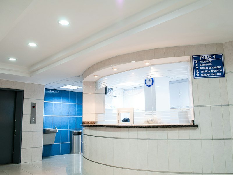 Bright, clean clinic interior with treatment area and natural daylight