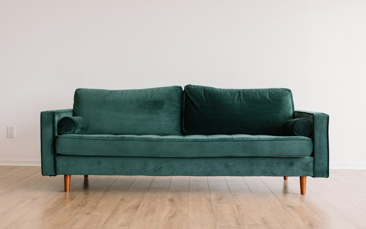 Neutral living room with sofa and cushions from a furnishings brand